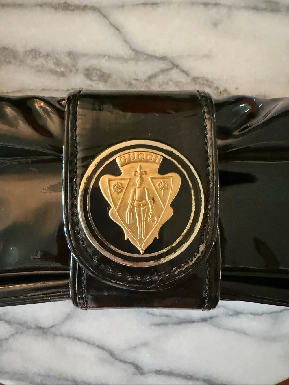 Vintage Gucci Black Patent Leather Clutch with Gold Crest